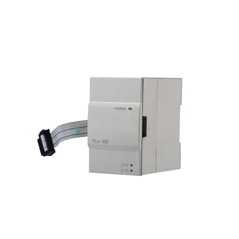 Mitsubishi FX2N-4AD Programmable Controller, new in box. Industrial PLC module, 24V A/D power.