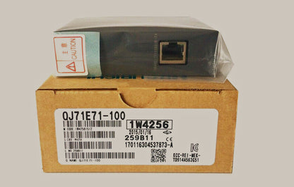 Mitsubishi QJ71E71-100 Ethernet Module in packaging, with caution sticker and product label.