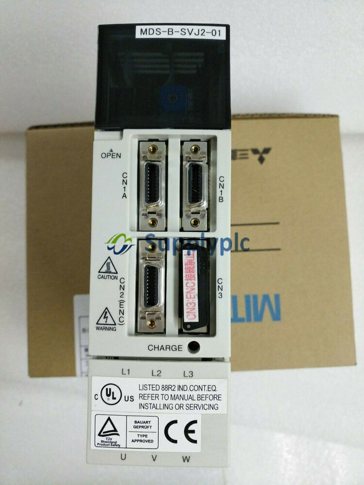 Mitsubishi MDS-B-SVJ2-01 Servo Drive Unit, industrial automation part, featuring multiple ports and safety labels, in box.
