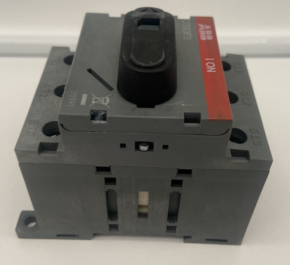 ABB OT63F3 Disconnector Switch, gray plastic body, black handle, and red label displaying specifications: 1 ON.