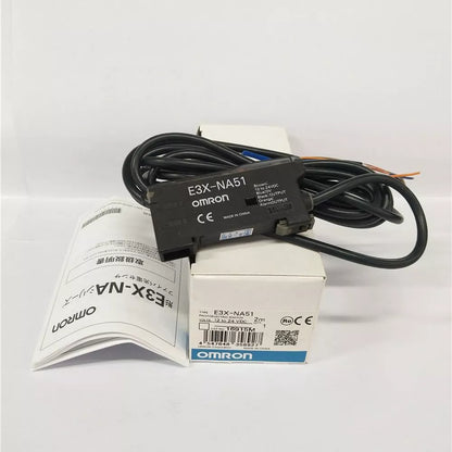 Omron E3X-NA51 Photoelectric Switch with packaging, 12-24VDC, black cable, and documentation, new.
