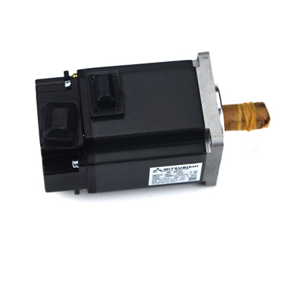 Mitsubishi HF-KP43 Servo Motor. Black body, silver end. Industrial automation equipment for sale.