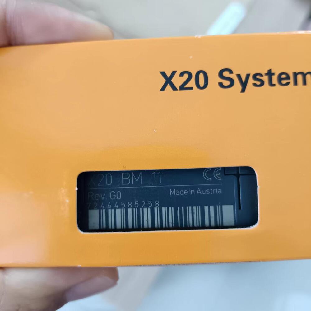B&R X20 BM11 backplane module on orange packaging. X20 System component, Made in Austria. Industrial automation part.
