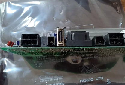 FANUC A20B-2101-0390 control board showing connectors and components, PLC spare part.