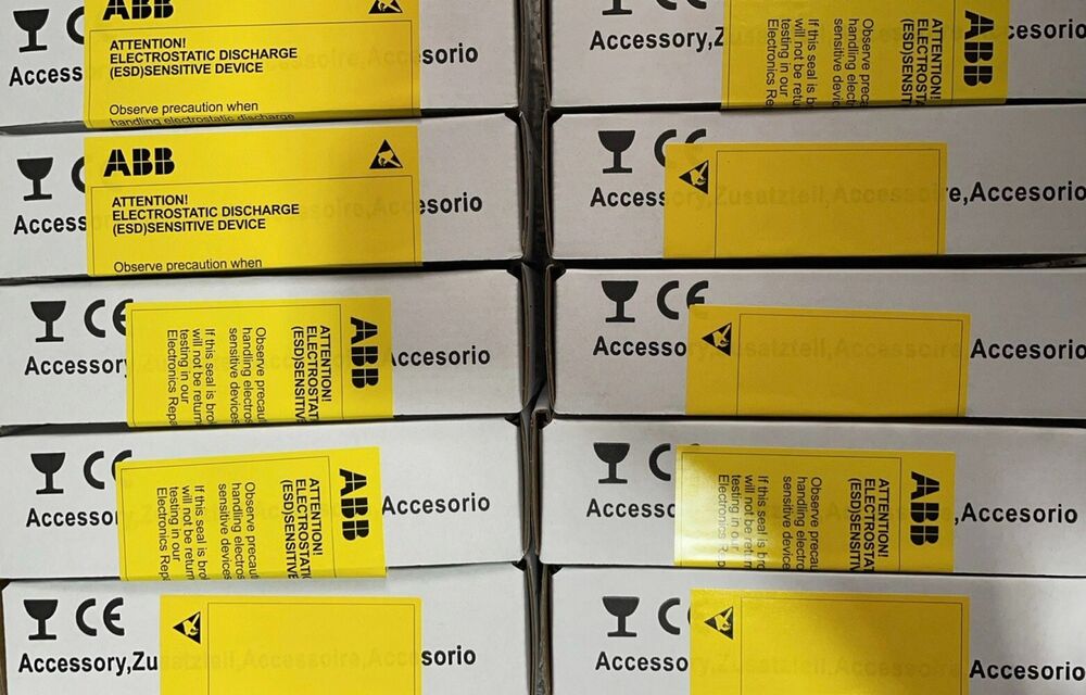 ABB FPBA-01 OPTION/SP KIT packaging, electrostatic discharge warning labels on boxes, industrial automation spare parts.