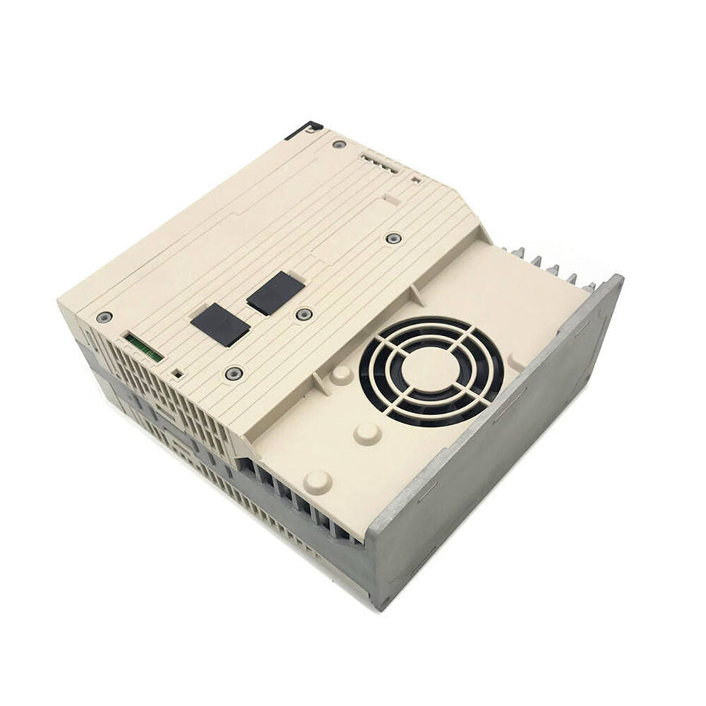 Yaskawa SGDV-5R5A11A Servo Drive. Industrial automation equipment, with beige and gray casing, featuring a cooling fan.