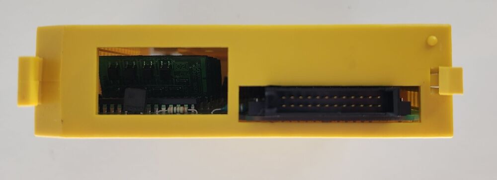 FANUC A03B-0807-C105 I/O Interface Module, yellow PLC module with connector, industrial automation part