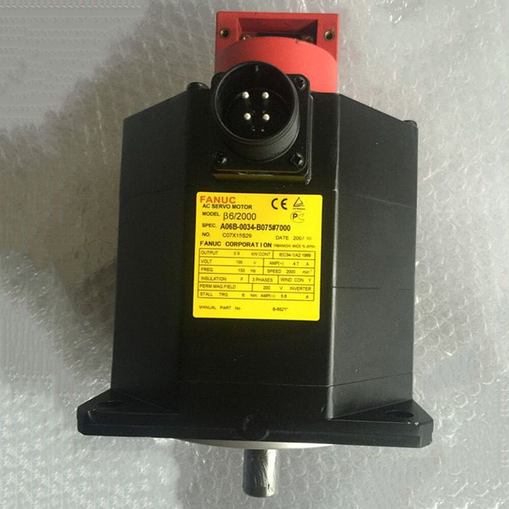 FANUC A06B-0034-B075#7000 Servo Motor, Black, Red, and Yellow industrial part
