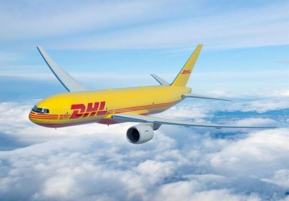 DHL cargo plane flying in the sky, transporting ABB Robot SMB Board 3HAC044168-001