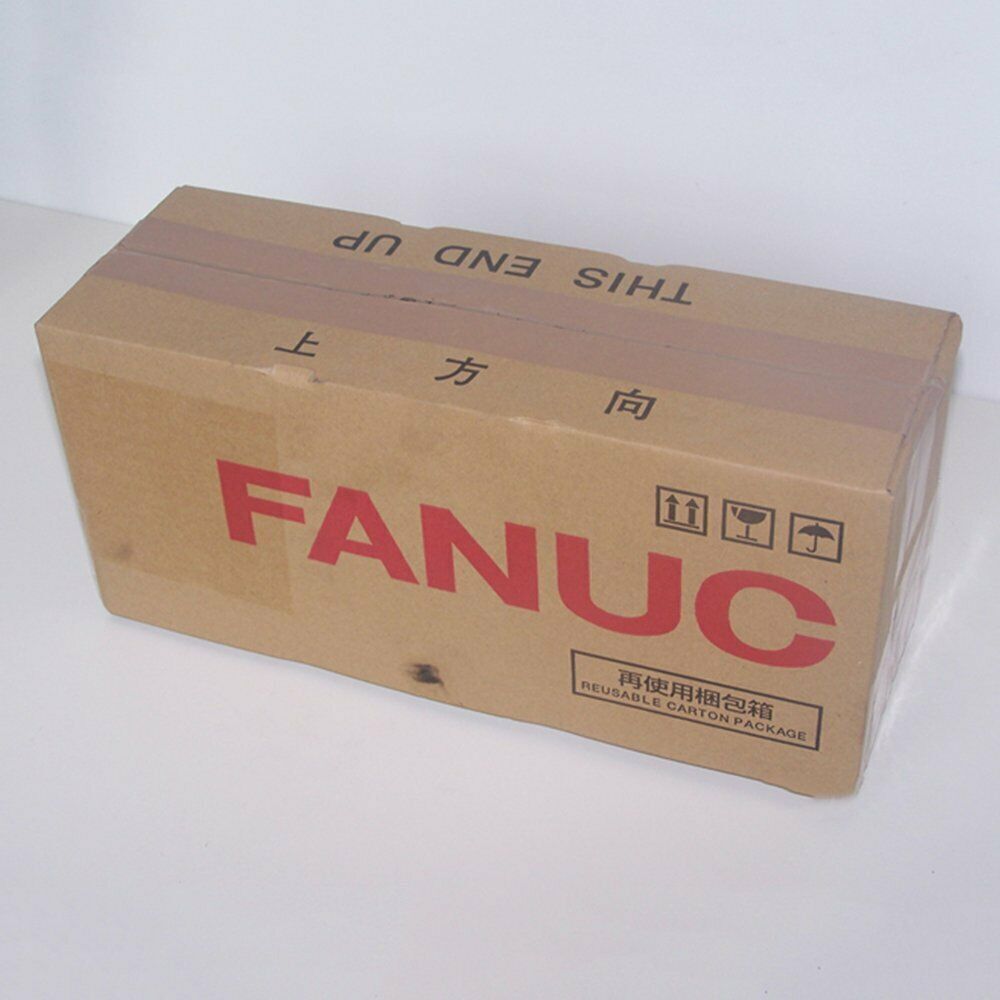 FANUC A06B-0034-B075#7000 servo motor box, factory packaging, reusable carton.