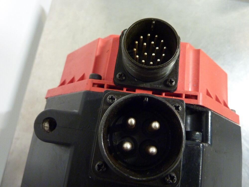 Fanuc AC Servo Motor connector detail, black and red housing, industrial automation part, close-up.