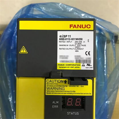 FANUC A06B-6112-H011#H550 Servo Driver, new in box, with caution warning label.