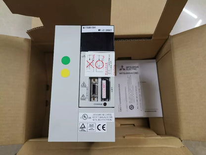 Mitsubishi MR-J2-200CT servo drive unit in box, industrial automation component.