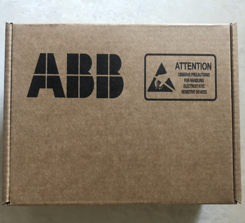 ABB RAIO-01 Analog I/O EXTENS module packaging box. Industrial automation part. ESD caution label.