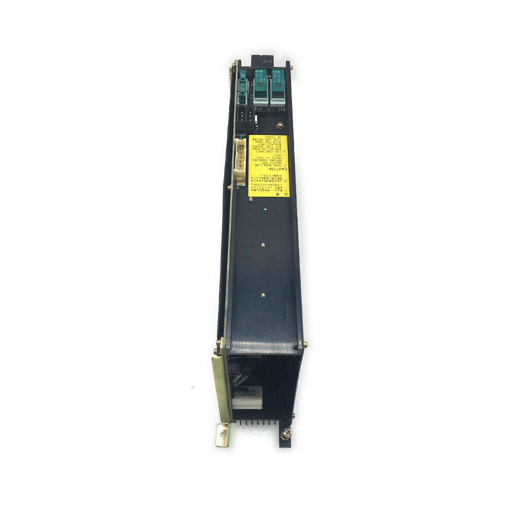 FANUC POWER UNIT A16B-1212-0100-01 PCB. Black enclosure with yellow warning label, industrial automation component.