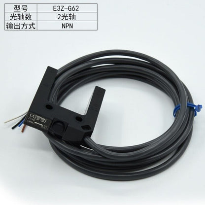 Omron E3Z-G62 photoelectric sensor with a black housing and a long cable, product detail view.
