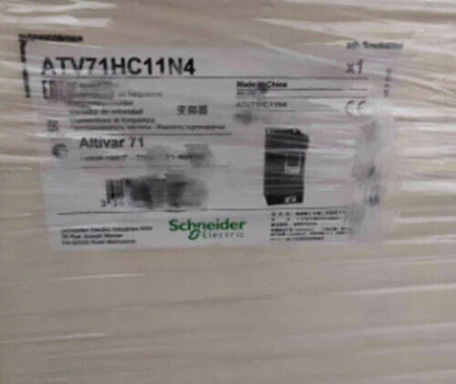 Schneider Electric ATV71HC11N4 frequency converter, Altivar 71 series industrial drive, wrapped for protection.