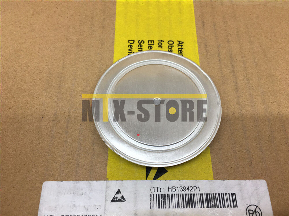 PLC component with label HB13942P1, industrial automation part.