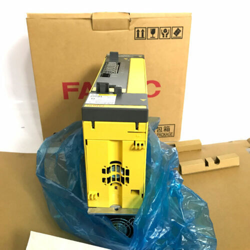 FANUC A06B-6111-H015#H550 Servo Drive in box, yellow and gray, Industrial Automation Component.