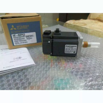 Mitsubishi HF-MP43 AC Servo Motor with box, industrial automation part.