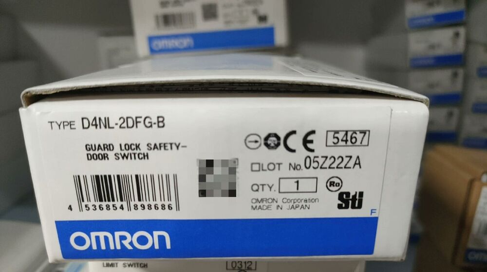 Omron D4NL-2DFG-B Safety Door Switch box. Features product information, including type, model number, and barcode.