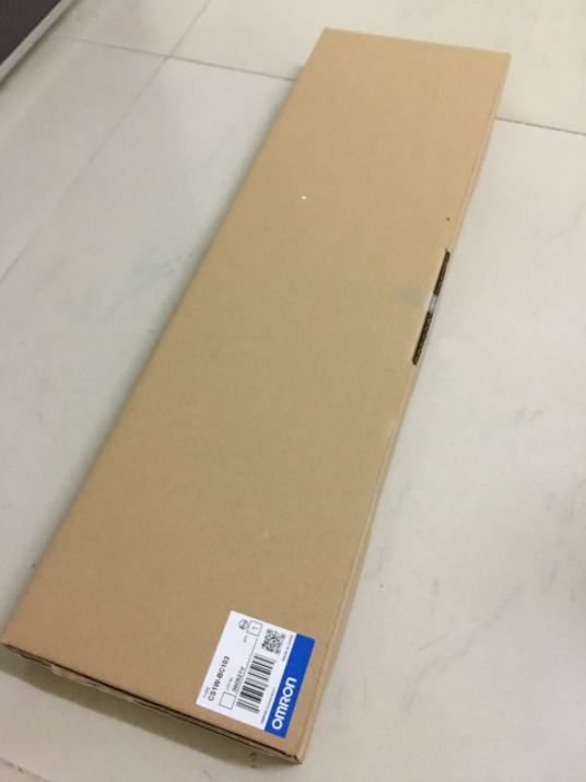 Omron CS1W-BC103 PLC Base Plate in cardboard box, new industrial automation part, fast shipping.