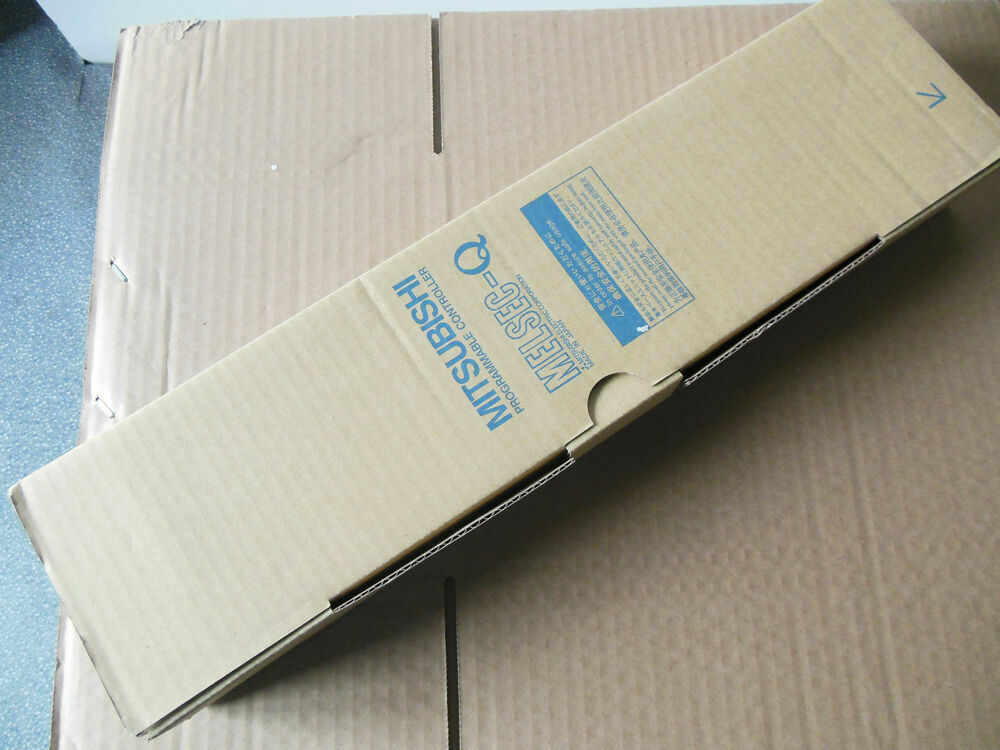 Mitsubishi Q612B PLC base unit in a cardboard box, fast shipping, MELSEC-Q programmable controller.