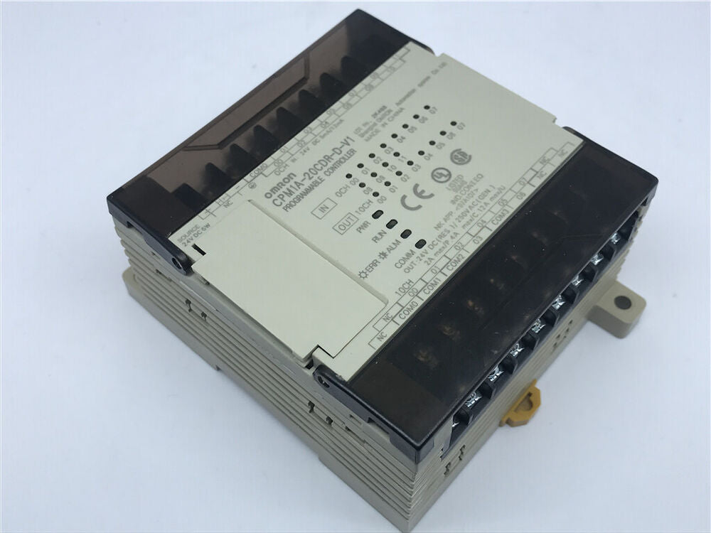 Omron CPM1A-20CDR-D-V1 PLC. Industrial automation controller with I/O ports and indicator lights.