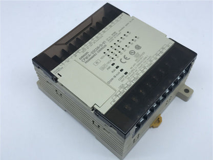 Omron CPM1A-20CDR-D-V1 PLC. Industrial automation controller with I/O ports and indicator lights.