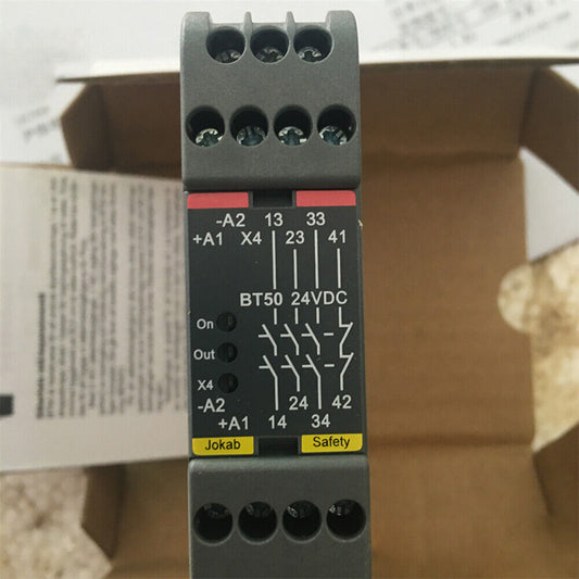 ABB PLC safety relay 24V BT50. Includes terminal markings, Jokab and Safety labels for industrial automation.