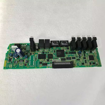FANUC A20B-2102-0671 circuit board, PLC module component with electronic components. Industrial automation part.