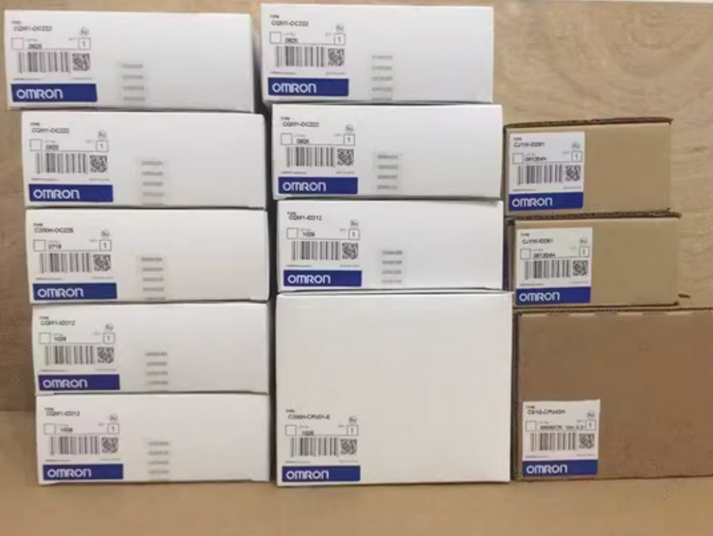 New Omron PLC Modules in boxes, ready for fast shipping. Industrial automation parts.