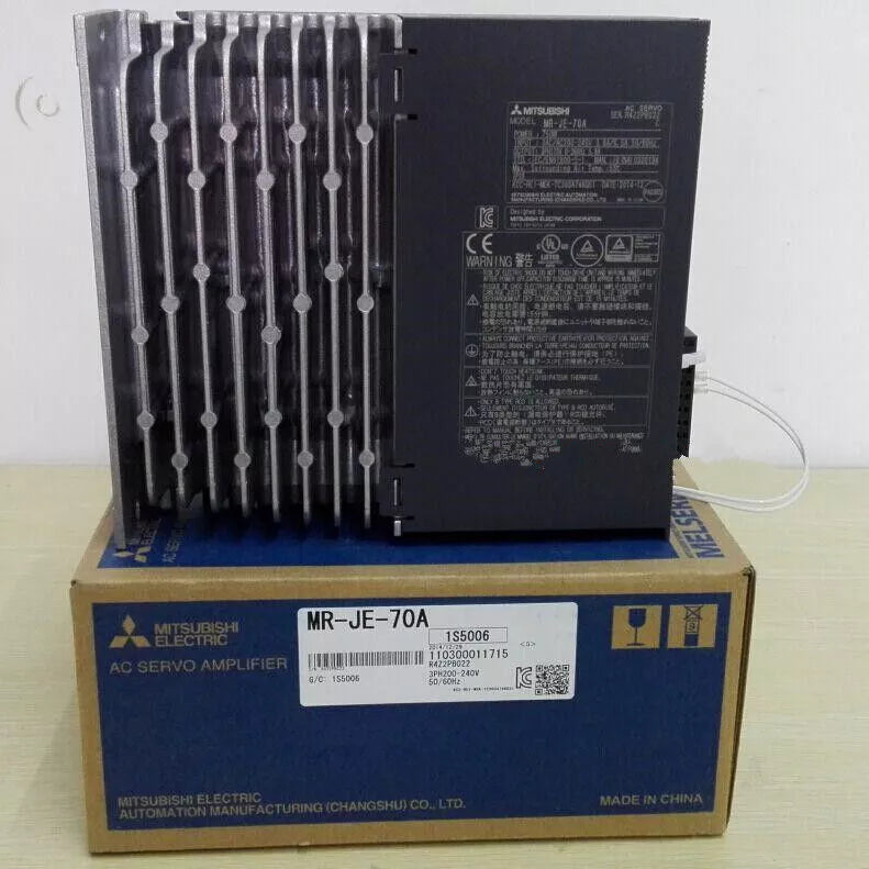 Mitsubishi MR-JE-70A AC Servo Amplifier on box. Industrial automation part, servo drive.