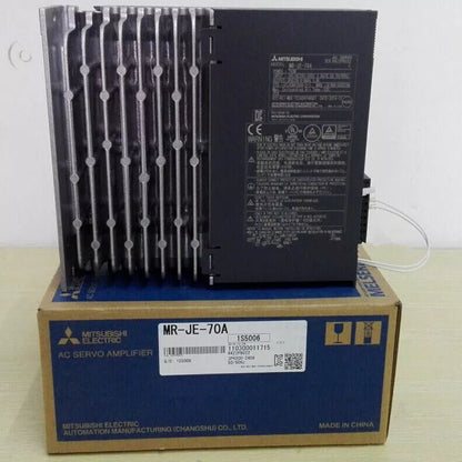 Mitsubishi MR-JE-70A AC Servo Amplifier on box. Industrial automation part, servo drive.