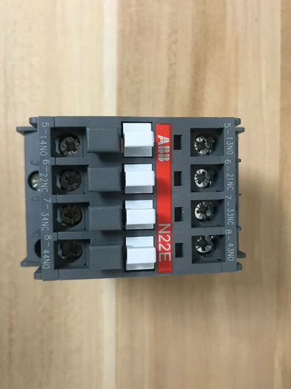 ABB N22E contactor relay, 24V PLC automation component. Top view of the gray industrial control part.
