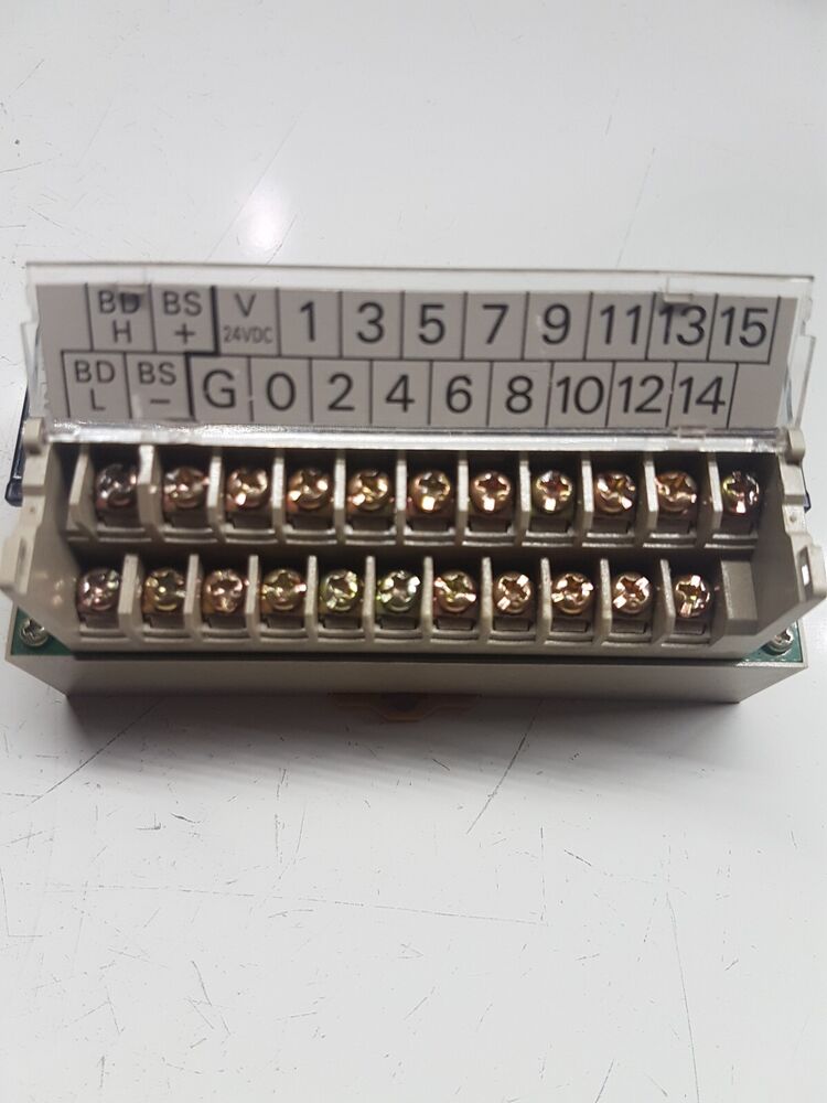 Omron SRT2-ID16-1 PLC Module, terminal block detail with labeled inputs and outputs.
