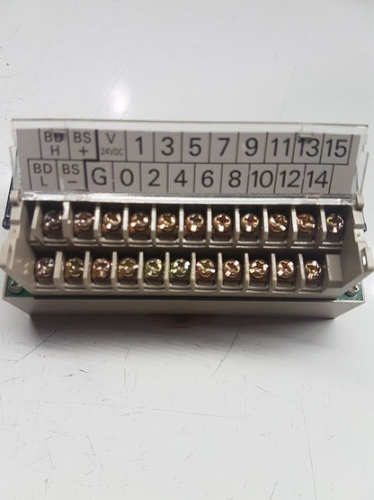 Omron SRT2-ID16-1 PLC Module, terminal block detail with labeled inputs and outputs.