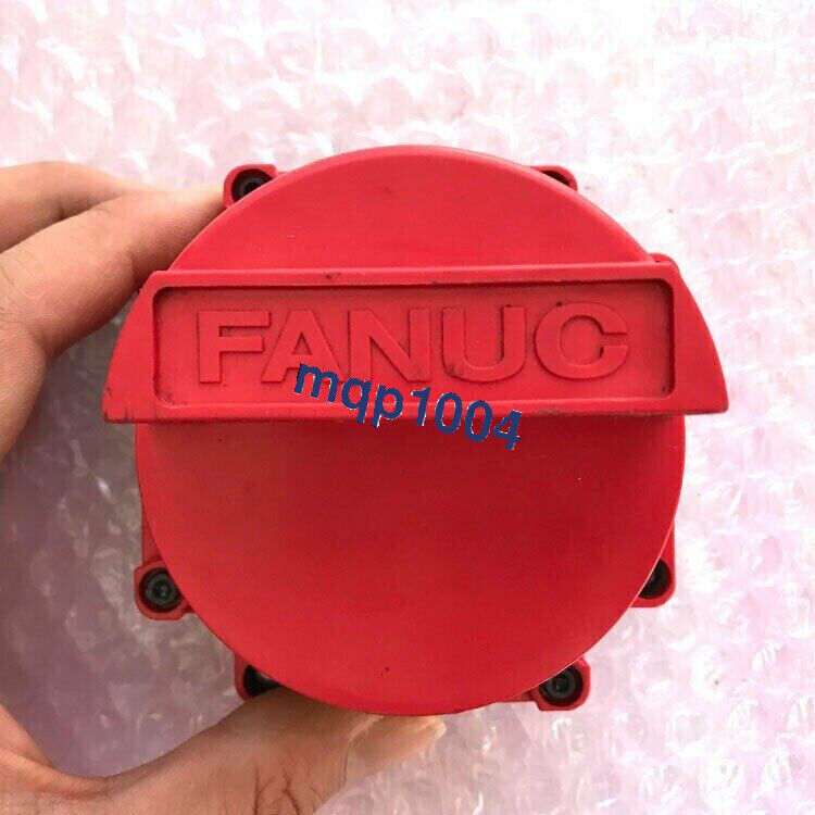 FANUC industrial automation part, red round component with mqp1004 marking, PLC part