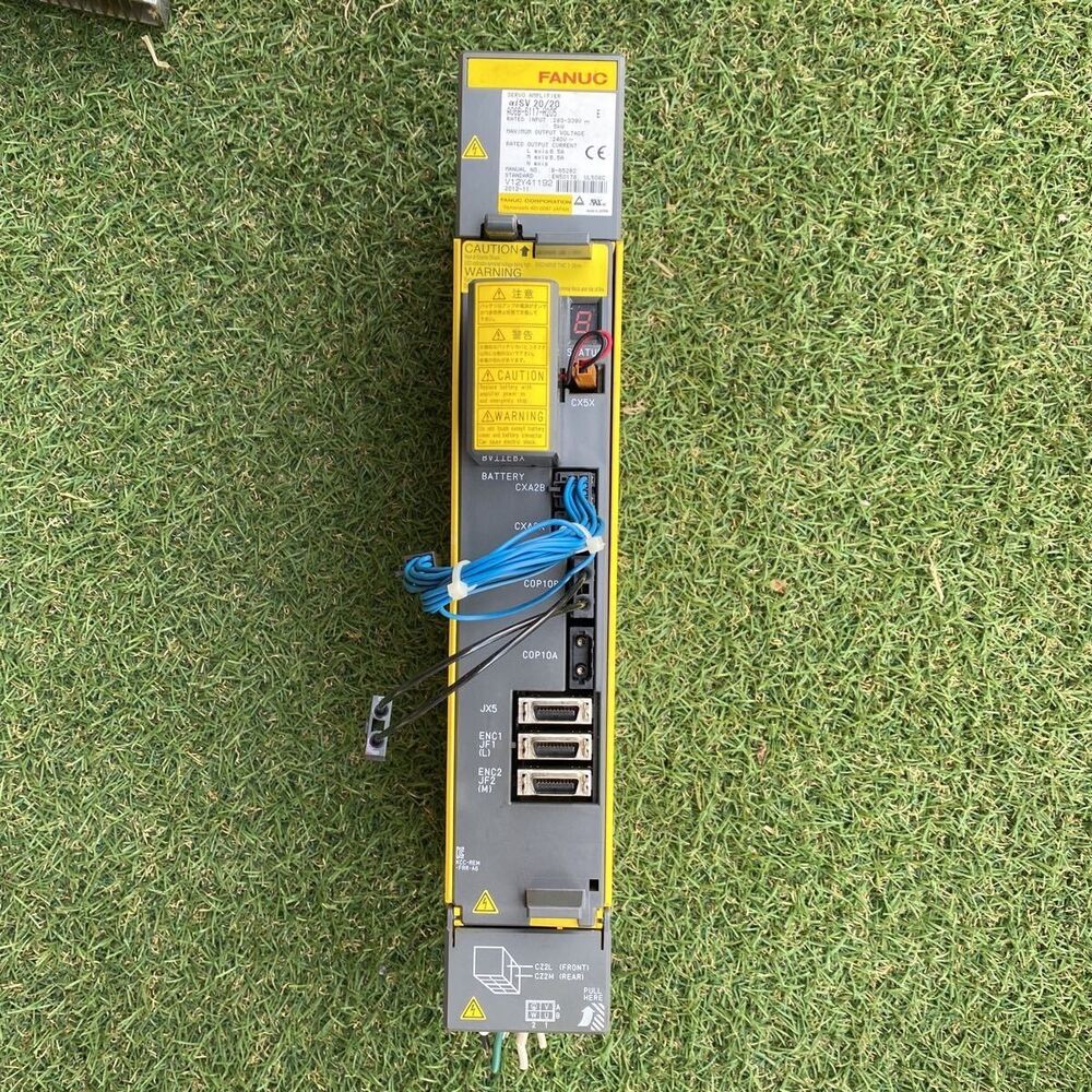 FANUC A06B-6117-H205 Servo Amplifier, industrial automation part with connectors and warning labels.