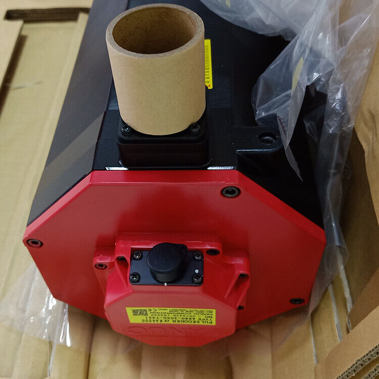New FANUC A06B-0215-B200 servo motor with red and black housing and mounting details, industrial automation part.