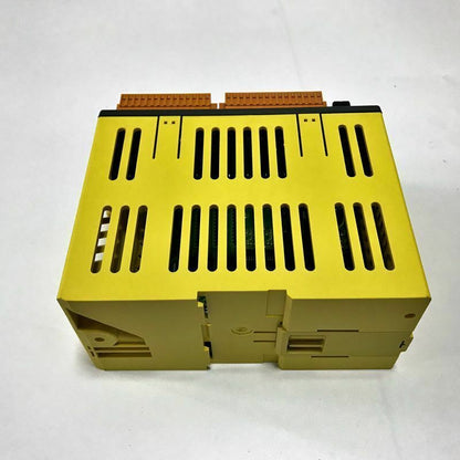 FANUC A03B-0823-C011 Terminal I/O Basic Module. Yellow industrial automation component.