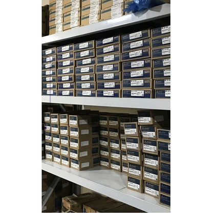 Mitsubishi Servo Drive parts in boxes on shelves, industrial automation components.