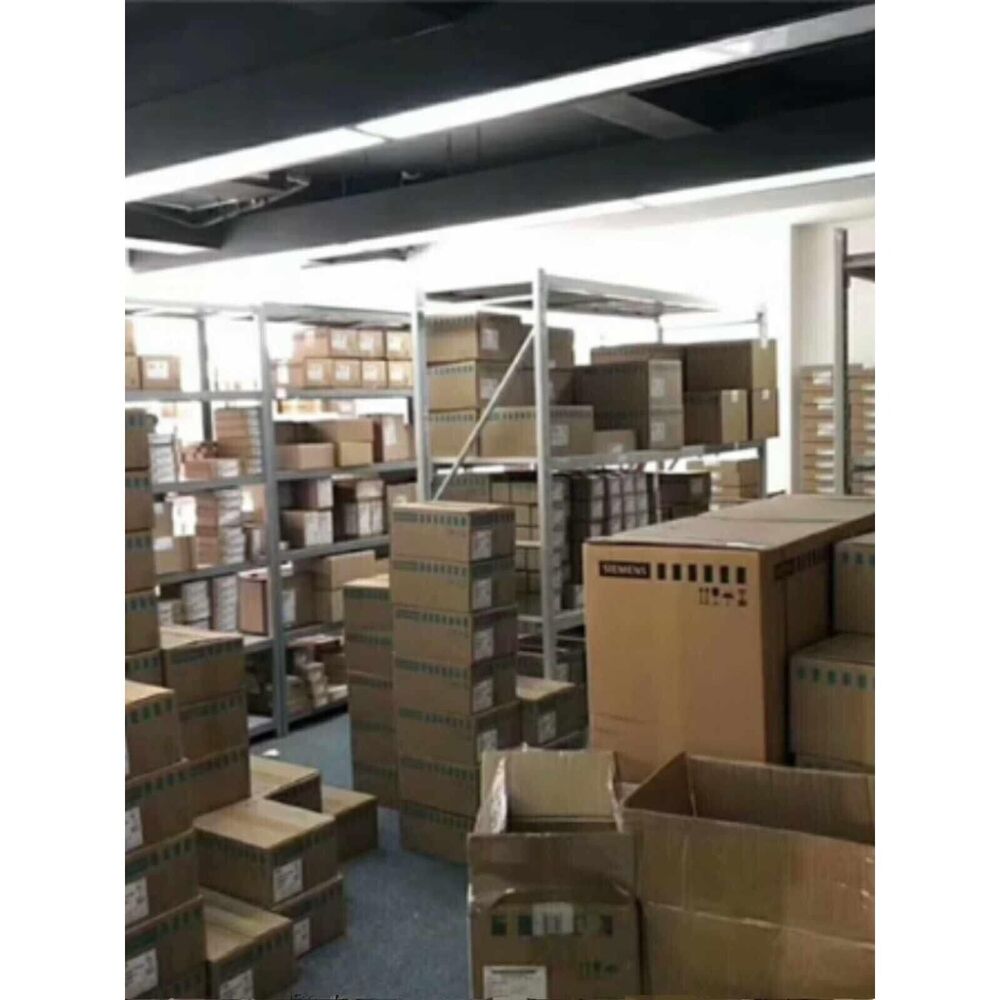 Warehouse stock of industrial automation components, including Siemens parts and PLC components.