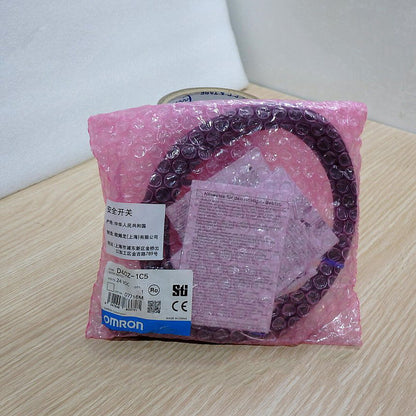 OMRON D40Z-1C5 Door Switch 24VDC in protective packaging, new industrial automation part.