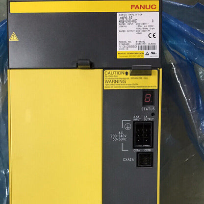 FANUC A06B-6140-H037 Servo Drive, yellow and black, industrial automation part with input/output.