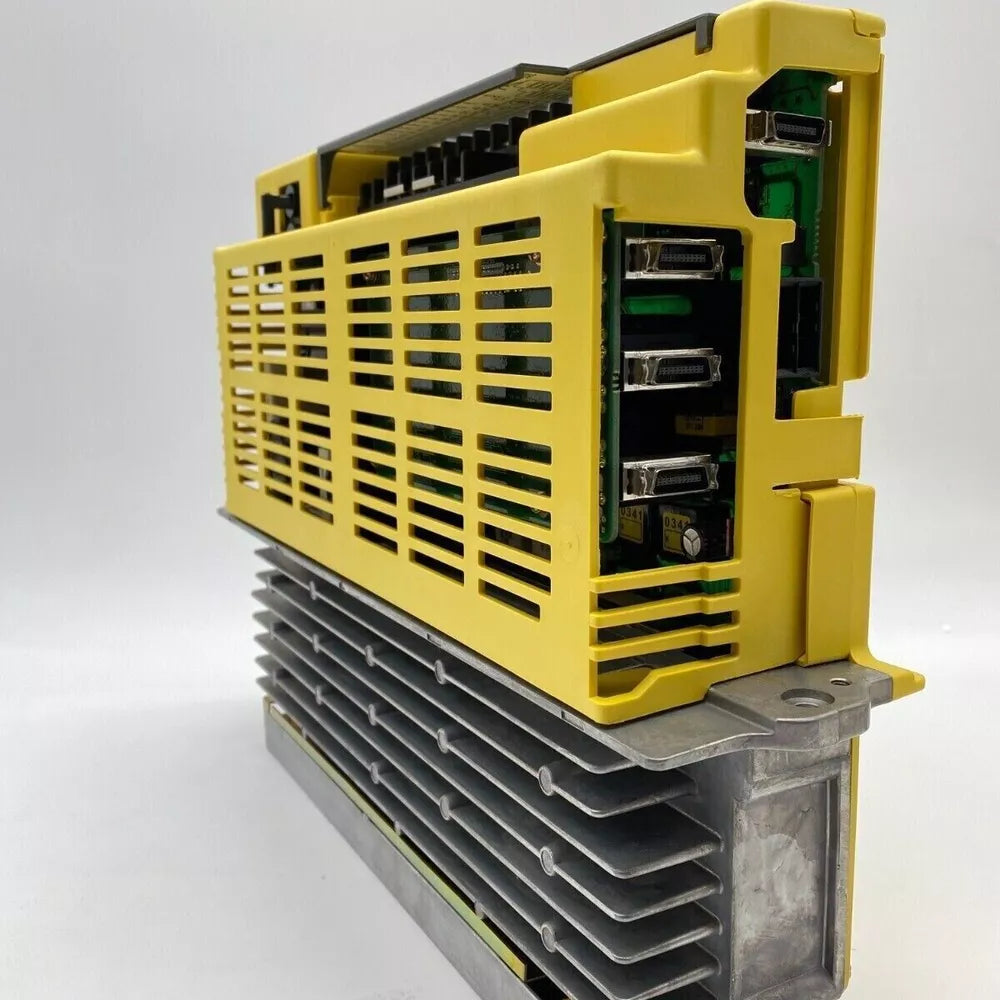 FANUC A06B-6090-H006 Servo Drive, yellow industrial automation part, front view, CE certified