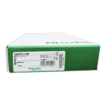 Schneider Electric 140CPS11100 Power Supply Module in its original box, showing product details and brand logo.