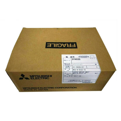 Mitsubishi MDS-B-SVJ2-10 servo drive unit in box, Fragile label. Made in Japan, industrial automation part.