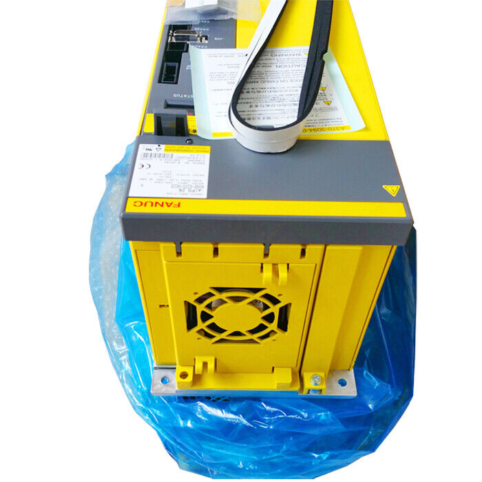 FANUC A06B-6200-H026 Servo Amplifier, new industrial automation part, yellow and gray, in packaging.