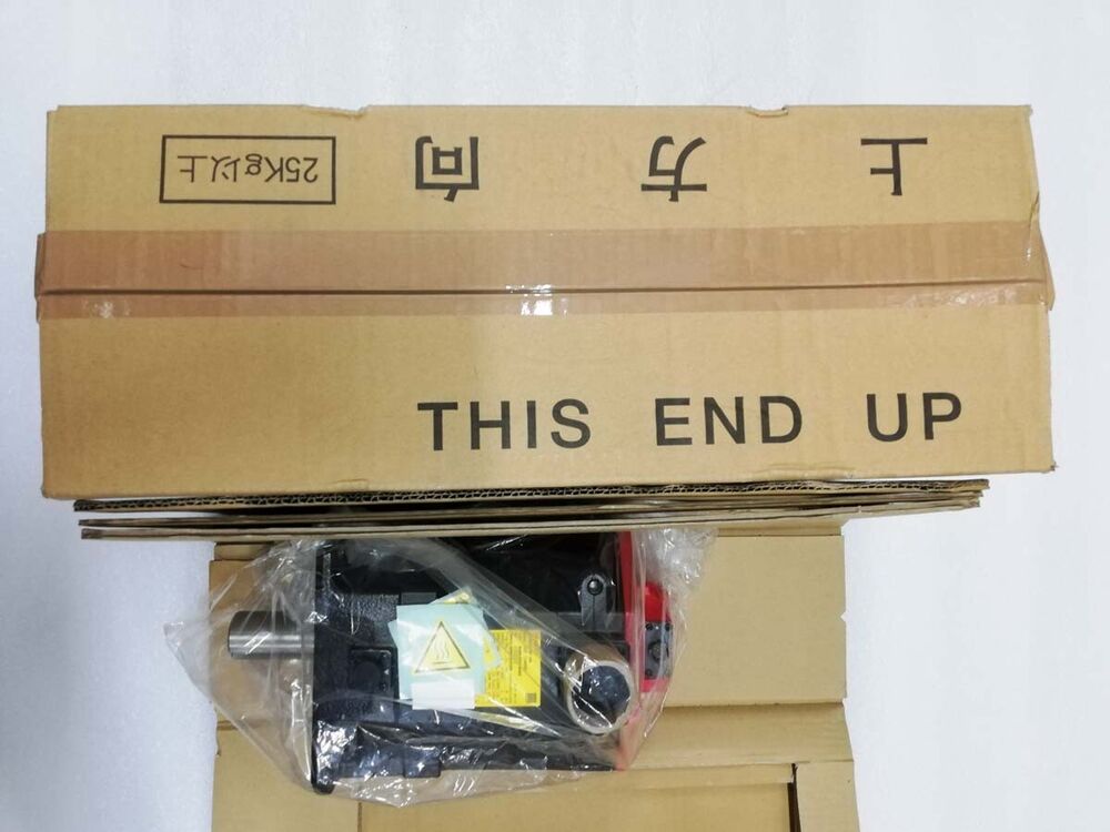 FANUC A06B-0243-B401 servo motor in packaging marked 'This End Up', 25KG以上, Industrial Automation Parts